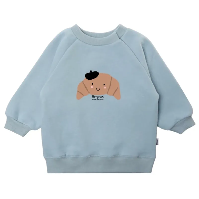 Kinder Sweatshirt mit Print 'Croissant Bonjour' blau
