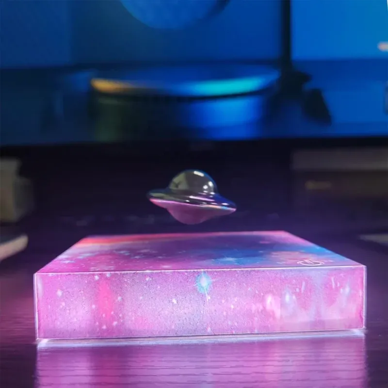 Magnetic Levitating Spaceship Rotating LED Night Lamp - Image 0